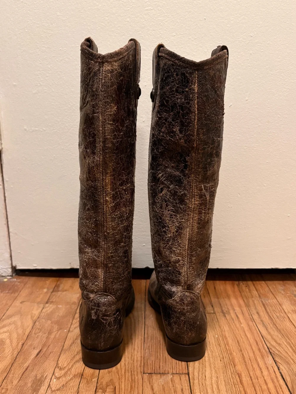 Frye brown leather knee-high boots with distressed texture